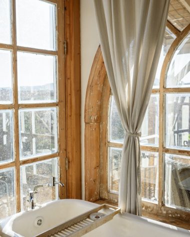 well lit bathroom in old fashioned interior