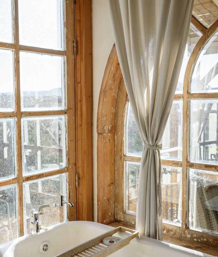 well lit bathroom in old fashioned interior